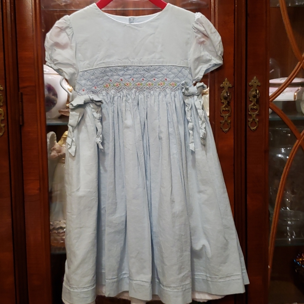 Smocked, light blue dress with Pink floral embroid
